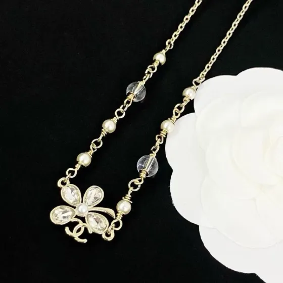 Chanel CC Clover Crystal Pearl Necklace necklace Light gold tone metal clear faceted crystal white faux pearl transparent resin bead 42cm with 5cm extender chain