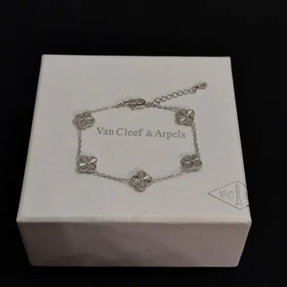 Van Cleef Arpels Alhambra bracelet silver metal with guilloche engraved clover motifs 19cm