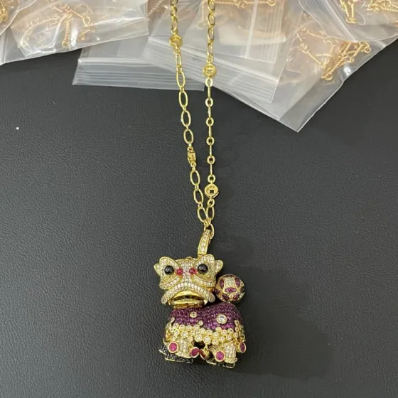 Qeelin Xi Xi Lion Dance necklace Yellow gold with clear diamonds rubies black onyx and purple gemstones 45cm