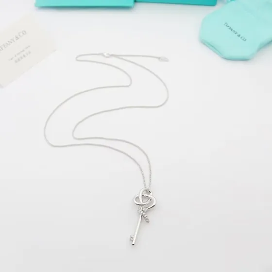 Tiffany Co Woven Keys necklace 18k rose gold with diamond accents 18 inches