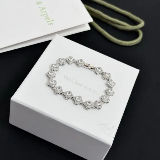 Van Cleef Arpels Alhambra bracelet silver-toned metal with clear diamond-like stones 17cm
