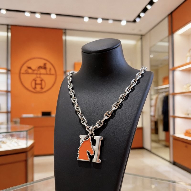 Hermes Cheval H Pendant necklace Silver-toned metal with orange enamel 60cm