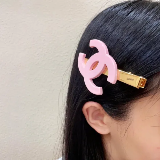 Chanel CC Logo Hair Clip brooch Gold-tone metal with light pink resin CC logo 6cm