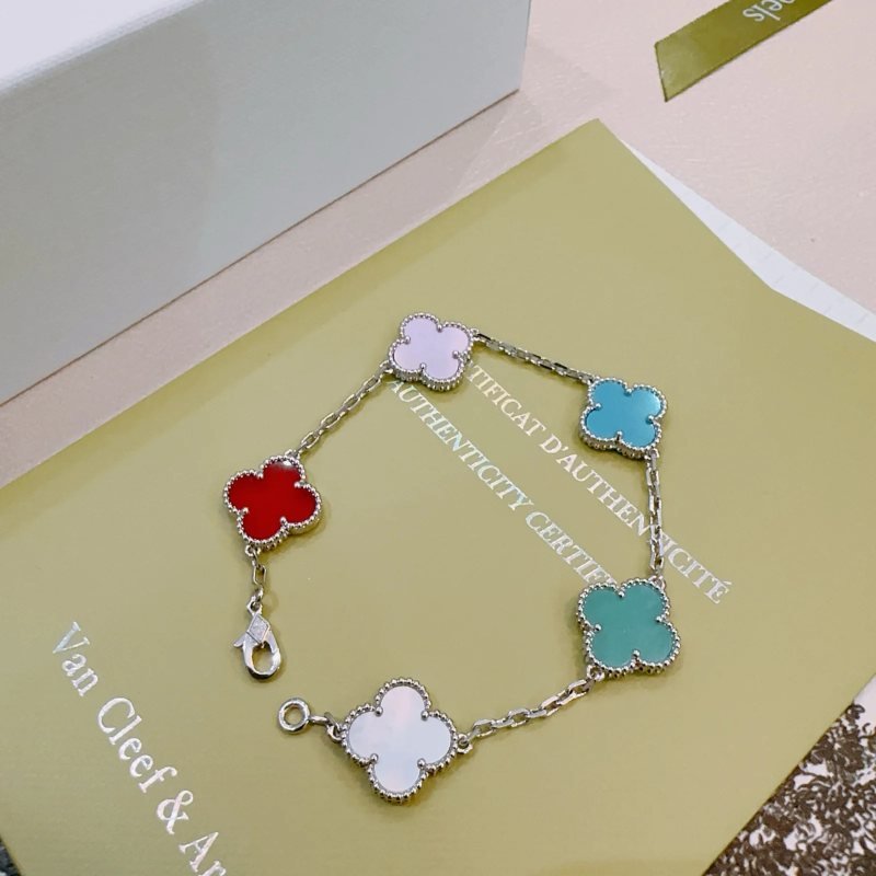 Van Cleef Arpels Alhambra bracelet silver-toned metal with red light purple turquoise blue teal green and white mother-of-pearl clover inlays 17cm
