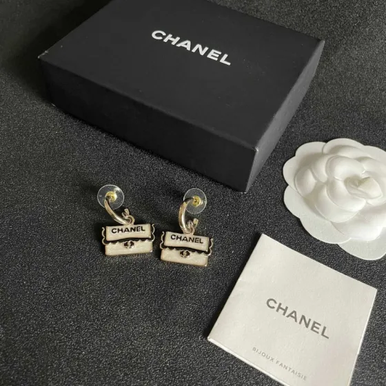 Chanel CC Logo Handbag Charm Drop Earrings earrings Light gold tone metal pearlescent white enamel black enamel lettering 1 5cm drop length