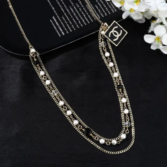 Chanel Goose Series CC Square Charm Pearl Beaded Waist Chain necklace Gold-tone metal with white faux pearls black faceted beads clear faceted beads and black enamel CC charm 80cm