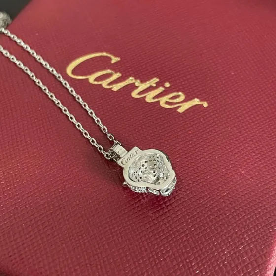 Cartier Panthere de Cartier necklace 18K white gold pave diamonds emerald eyes blue sapphire accent 42cm