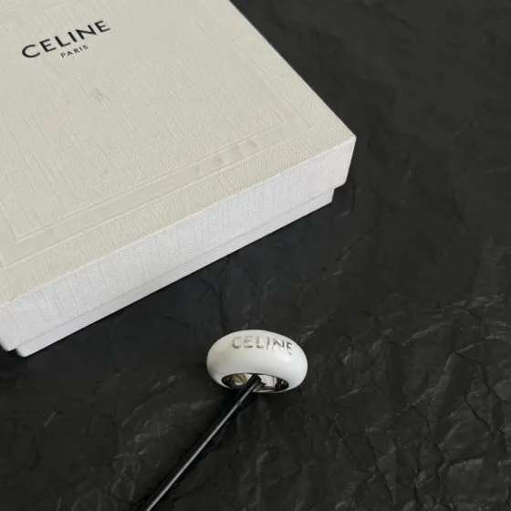 Celine Logo Dome Resin Ring ring White resin with silver-tone metal burgundy resin with gold-tone metal US 7