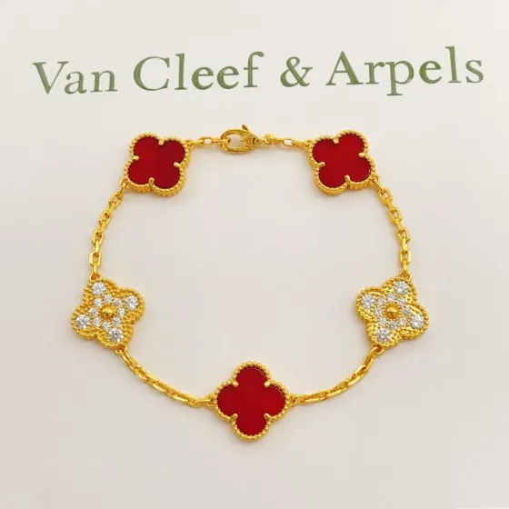 Van Cleef Arpels Vintage Alhambra bracelet Yellow gold with red carnelian and clear diamond accents 18cm