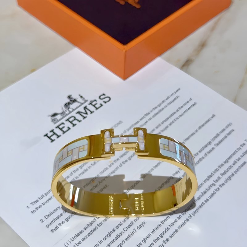 Hermes Clic H bracelet gold-tone metal with pale blue and white enamel PM