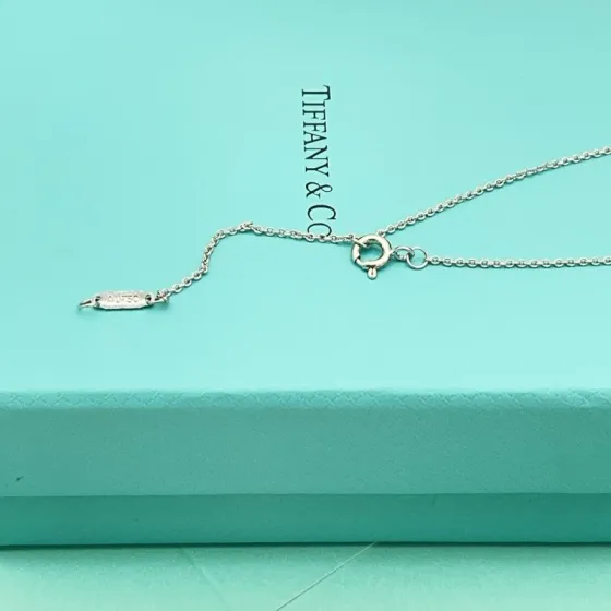 Tiffany Co Tiffany Keys Fleur de Lis Key Pendant necklace 18k white gold with diamond accents 18 inches