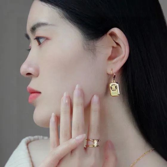 Celine Triomphe Cutout Tag earrings gold-tone metal no gemstones 2 5cm drop length