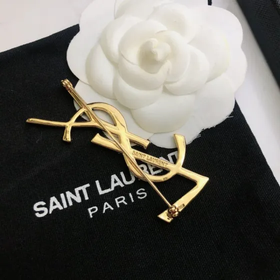 Saint Laurent 05038100 YSL Monogram brooch Gold-tone metal black enamel clear crystal pave 4 5cm width