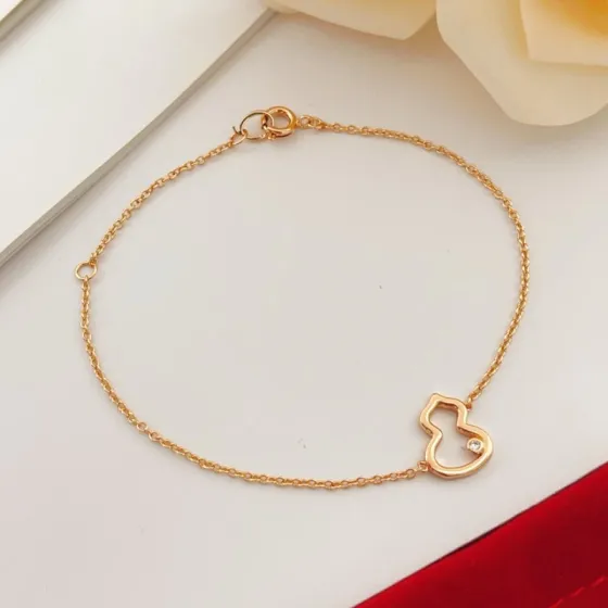Qeelin Wulu bracelet 18K rose gold with single clear diamond accent 17cm