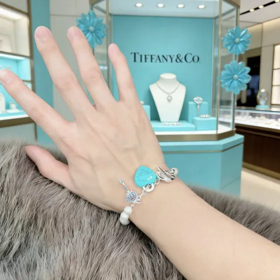 Tiffany Co Return to Tiffany Heart Tag Key Pearl Toggle Bracelet bracelet Sterling silver white freshwater pearl signature Tiffany blue enamel blue sapphire accent stones 7 inches