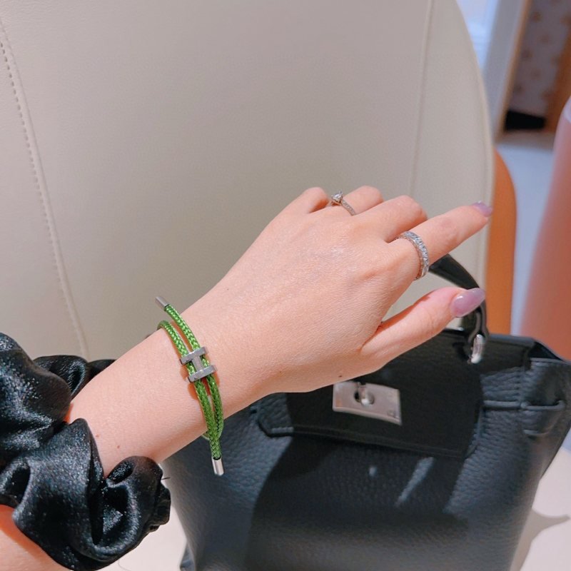 Hermes Tournis Tresse bracelet palladium silver hardware bright green braided cord adjustable sliding closure fits 15-18cm wrist