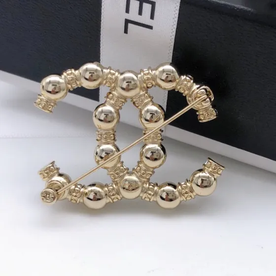Chanel CC Pearl Crystal Brooch brooch gold tone metal white faux pearl clear crystal 3 5cm width