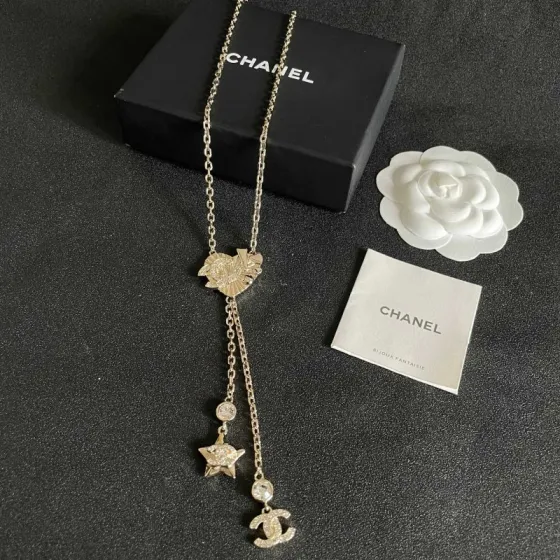 Chanel CC Heart Star Lariat necklace light gold metal with clear crystal accents 42cm