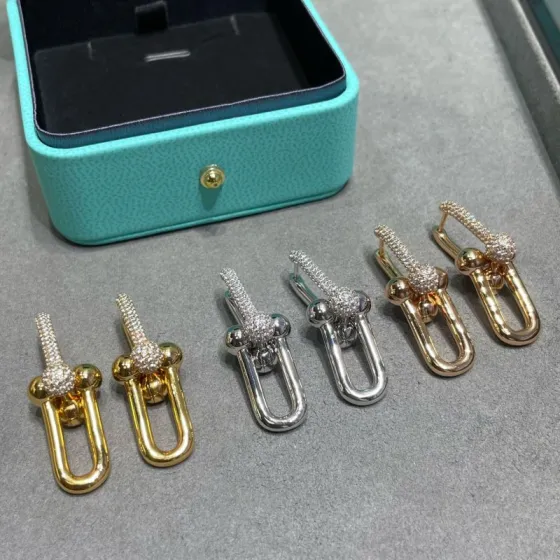 Tiffany HardWear earrings Available in 18k yellow gold 18k rose gold and sterling silver with pave set clear diamonds 3 5cm drop length