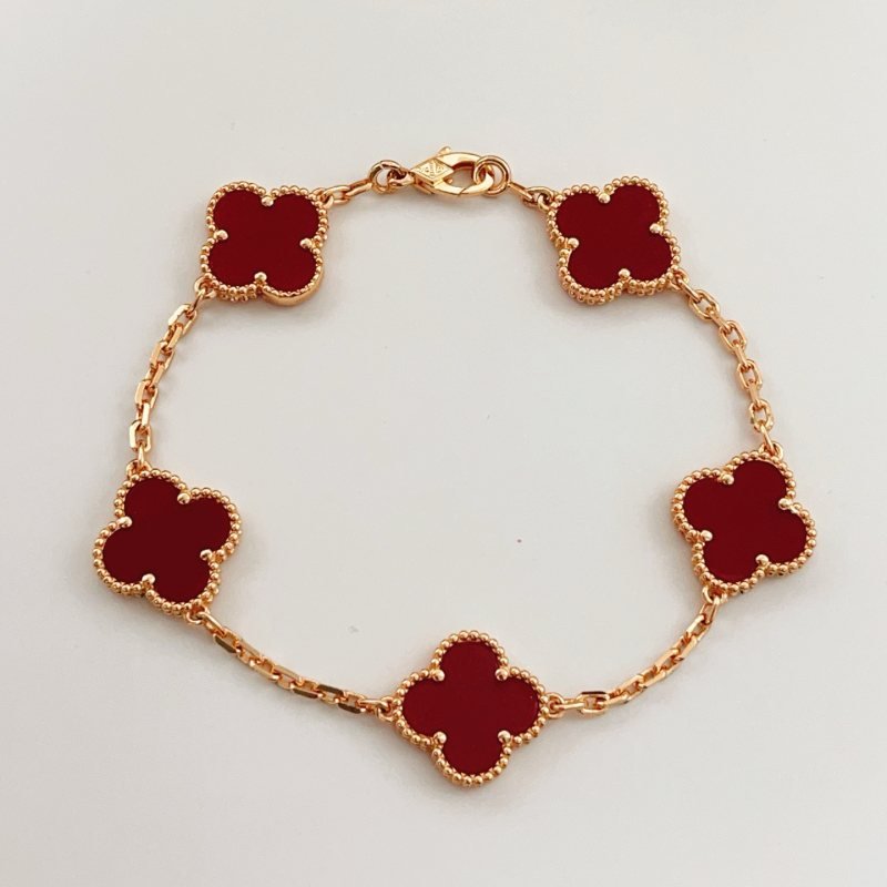 Van Cleef Arpels Alhambra bracelet Rose gold metal with deep red carnelian clover motifs 18cm