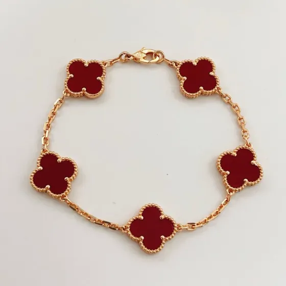 Van Cleef Arpels Alhambra bracelet Rose gold metal with deep red carnelian clover motifs 18cm