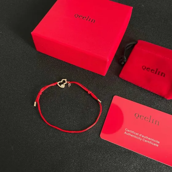 Qeelin Kirin Mini Gourd bracelet gold-toned metal clear diamond accent red cord adjustable sliding knot fits 15-19cm wrist