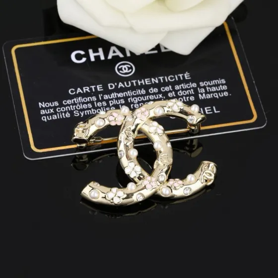 Chanel CC Logo Floral Pearl Crystal Brooch brooch gold tone metal white faux pearl clear crystal pink and white enamel floral accents 3 5cm width