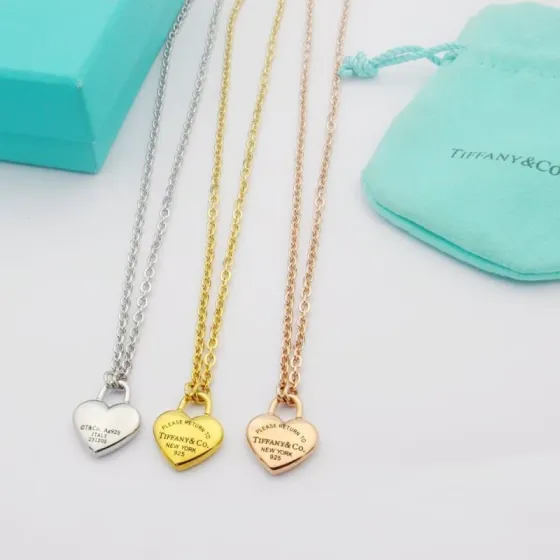 Tiffany Co Return to Tiffany Heart Lock Pendant necklace Sterling silver 18k yellow gold 18k rose gold no gemstones 18 inches