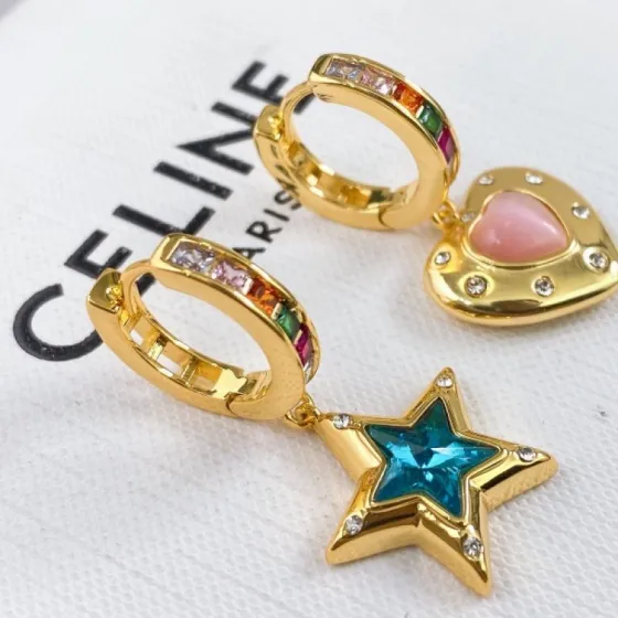 Celine Asymmetric Heart Star Rainbow Crystal Huggie Earrings earrings Gold-tone metal with multicolor rainbow crystals pink opal-style heart stone blue crystal star and clear accent crystals 12mm hoop diameter 20mm total drop length