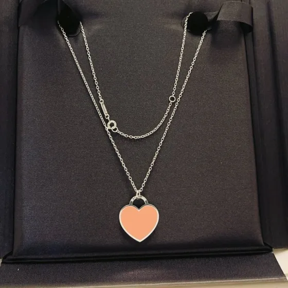 Tiffany Co Return to Tiffany Heart Tag necklace Sterling silver with peach pink enamel 18 inches