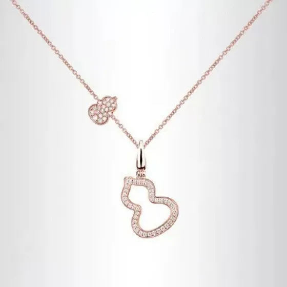 Qeelin Wulu necklace Available in rose gold platinum and yellow gold all set with clear pave diamonds 42cm