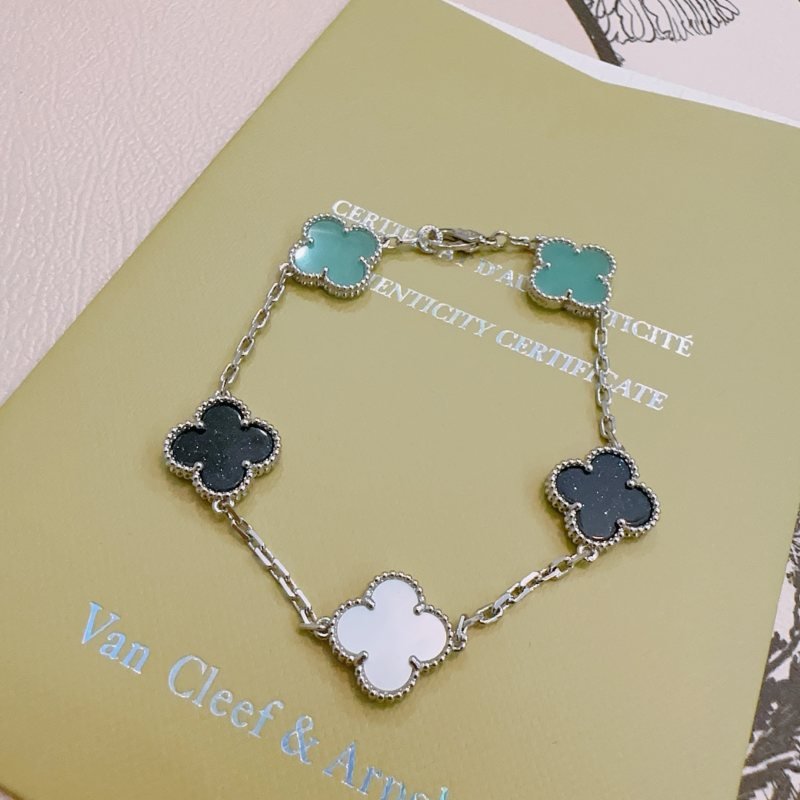 Van Cleef Arpels Alhambra bracelet Silver-toned metal with turquoise black aventurine and white mother-of-pearl clover motifs 17cm