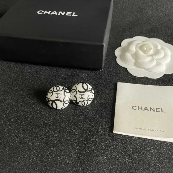 Chanel CC Logo Round Stud Earrings earrings white resin base with black interlocking CC logo detailing 2cm diameter