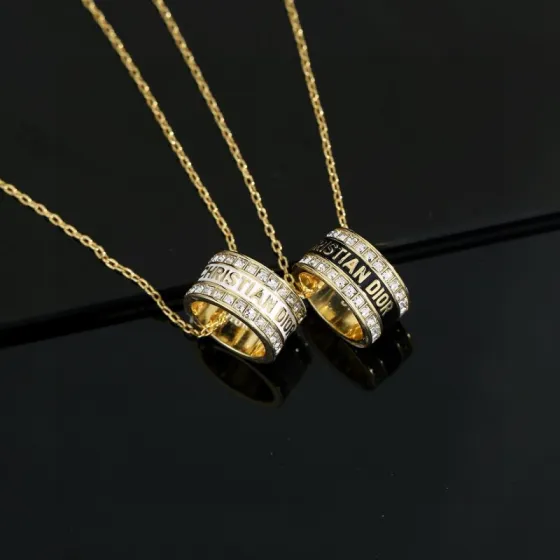 Dior JaDior Christian Dior Code Ring Pendant necklace gold-tone metal with clear crystal accents available with black enamel or white enamel lettering 42cm with 5cm extender