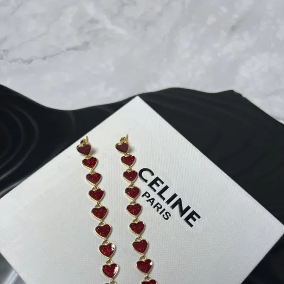 Celine YHED055 Glitter Heart Drop earrings gold-tone metal with glittery deep red enamel heart accents 6 5cm drop length