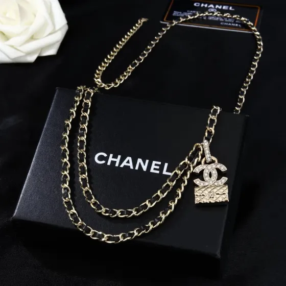 Chanel Goose series CC quilted bag charm chain necklace gold-tone metal with black leather inlay clear crystal accents 80cm