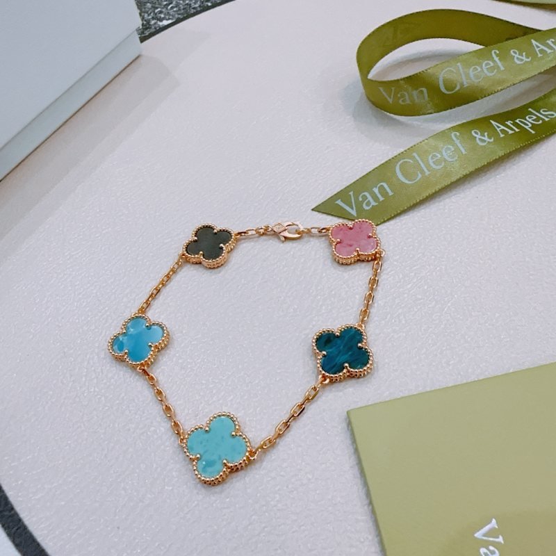 Van Cleef Arpels Vintage Alhambra bracelet Rose gold metal with multicolor clover stones including dark gray pink light sky blue teal blue and turquoise 18cm