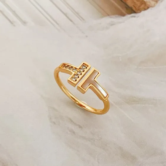 Tiffany Co T Wire ring 18k yellow gold white mother-of-pearl clear diamond 7