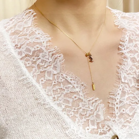 Saint Laurent Cassandre YSL Logo Lariat necklace gold-tone metal 45cm with 5cm extender