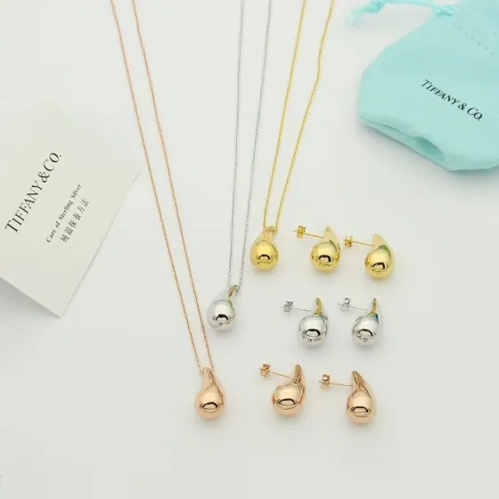Tiffany Co Teardrop earrings Sterling silver 18k yellow gold 18k rose gold no gemstones 10mm
