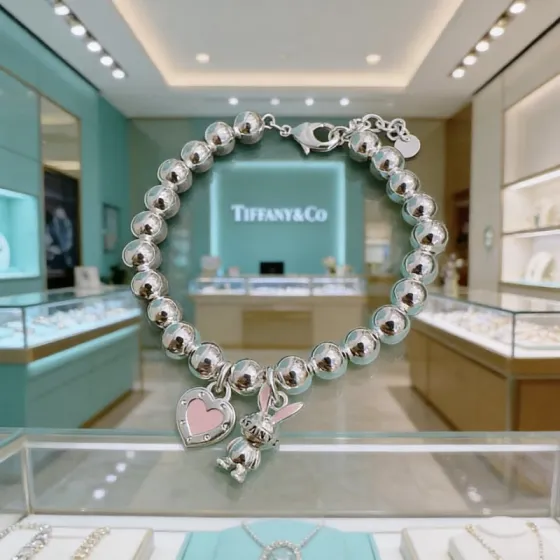 Tiffany Co Return to Tiffany Bead Charm Bracelet bracelet Silver metal with pink enamel accents 18cm