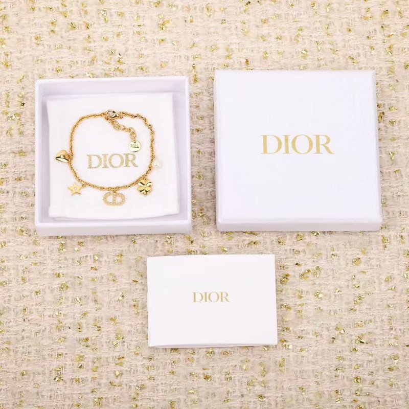 Dior Petit CD Lucky Charms bracelet Gold-tone metal with clear crystal accents and white faux pearl charm 17cm