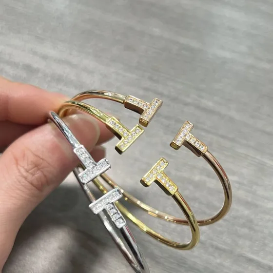 Tiffany Tiffany T bracelet 18k rose gold with clear diamond pave accents 17cm inner circumference