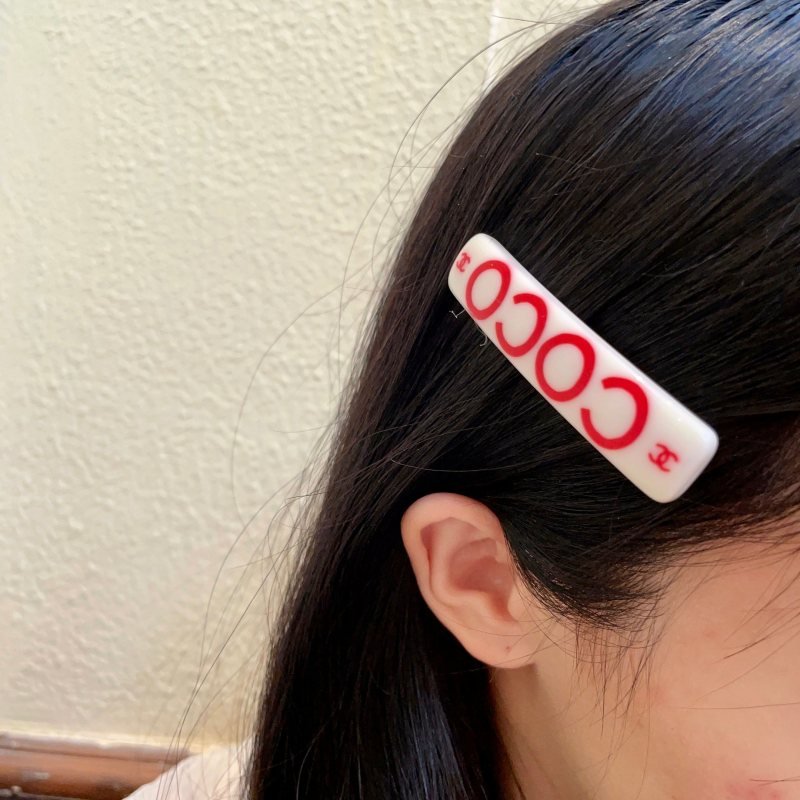 Chanel COCO brooch white base with red printed logos and text 6cm