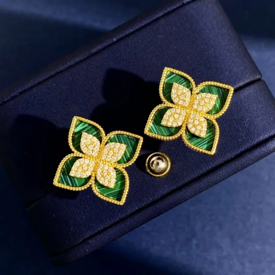 Van Cleef Arpels Constantin Four Leaf Flower earrings Yellow gold with clear pave diamonds available with malachite mother-of-pearl or onyx inlays 15mm diameter