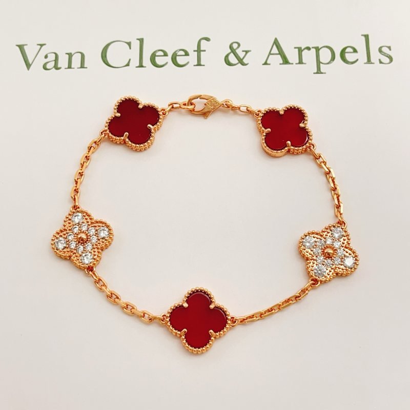Van Cleef Arpels Vintage Alhambra bracelet Rose gold with carnelian red and clear diamond accents 18cm