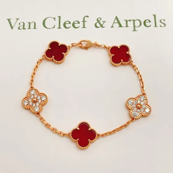 Van Cleef Arpels Vintage Alhambra bracelet Rose gold with carnelian red and clear diamond accents 18cm