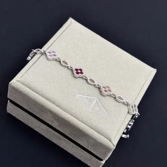 Van Cleef Arpels Alhambra bracelet Silver-toned metal with multicolor gemstones pink red champagne yellow purple dark blue green accented by white diamonds 17cm