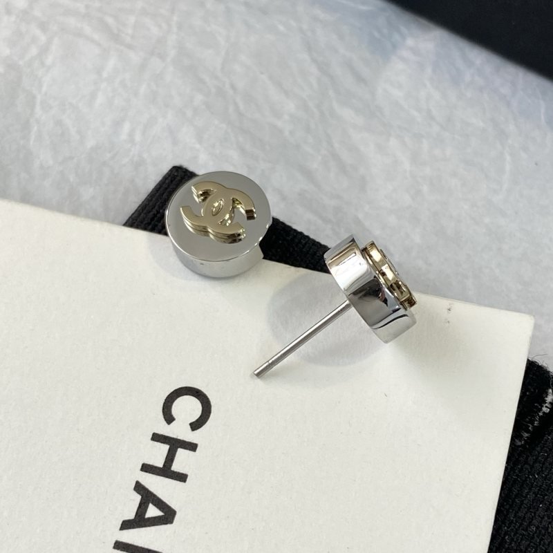 Chanel CC Logo Round Stud Earrings earrings silver-toned metal with gold-toned interlocking CC logo 10mm diameter
