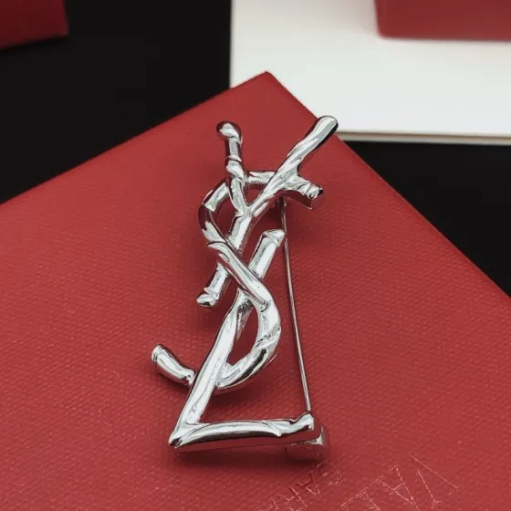 Saint Laurent Cassandre Twisted Monogram Brooch brooch silver-toned metal no accent stones 4 5cm height